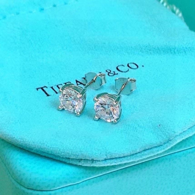 T*f*ny earrings